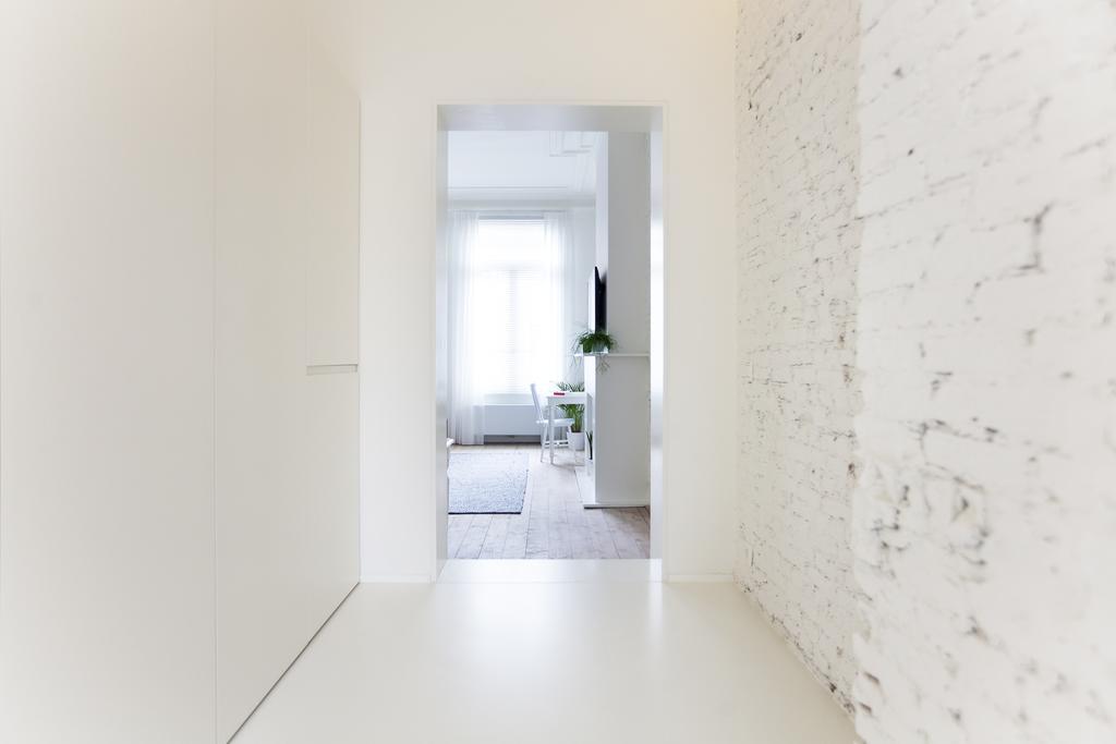 Maison Nationale City Flats & Suites Anversa Camera foto Interior of the house